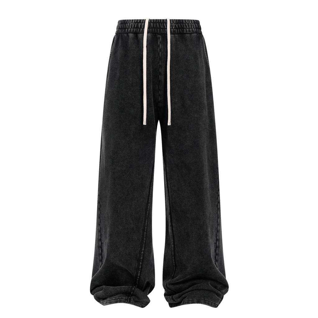 Vintage wash custom sweatpants with wide-leg fit and raw-edge patchwork front view