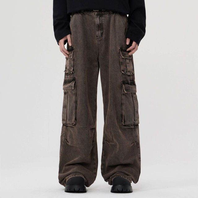 Wide leg denim cargo pants by custom jeans manufacturer with mid-rise fit, button-and-zip fly, belt loops, and side cargo pockets