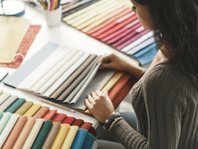 Collection of sustainable fabric samples with different textures, colors, and eco-friendly properties