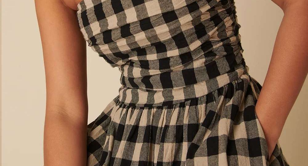 Checkered print strapless maxi dress with concealed side pockets