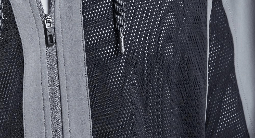 Track jacket interior lining construction designed for insulation and breathable comfort