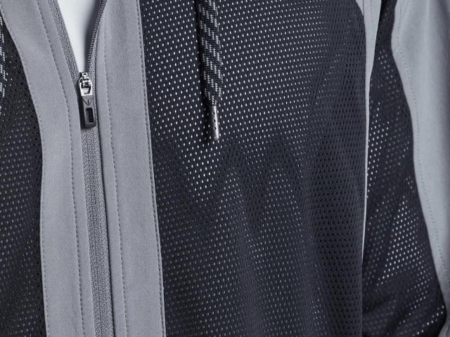 Track jacket interior lining construction designed for insulation and breathable comfort