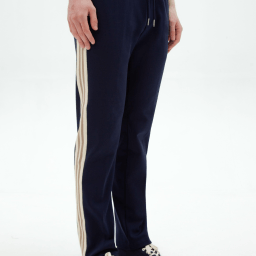 Custom track pants with side seam taping designed for sportswear performance and modern athletic style