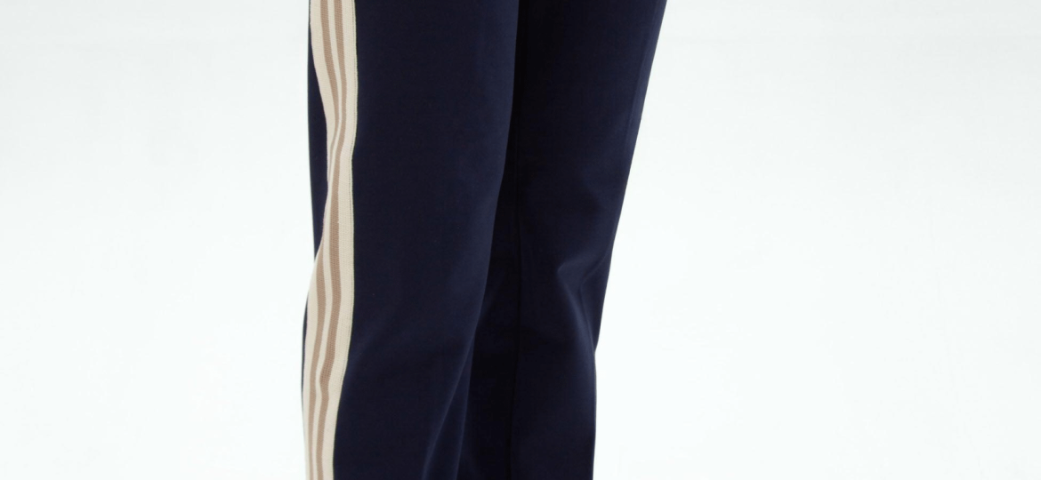 Custom track pants with side seam taping designed for sportswear performance and modern athletic style