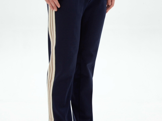 Custom track pants with side seam taping designed for sportswear performance and modern athletic style