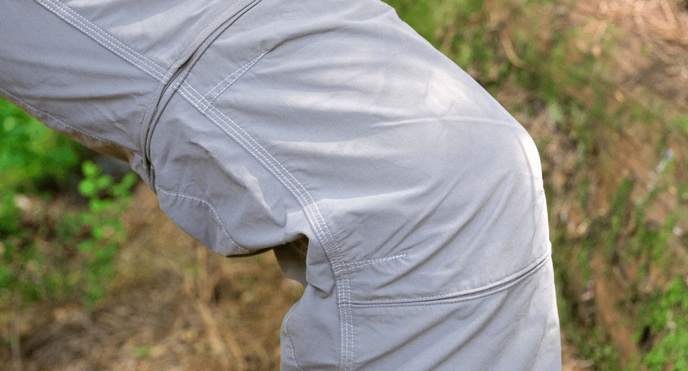 Articulated knee panel construction allowing natural movement and improved mobility in hiking pants