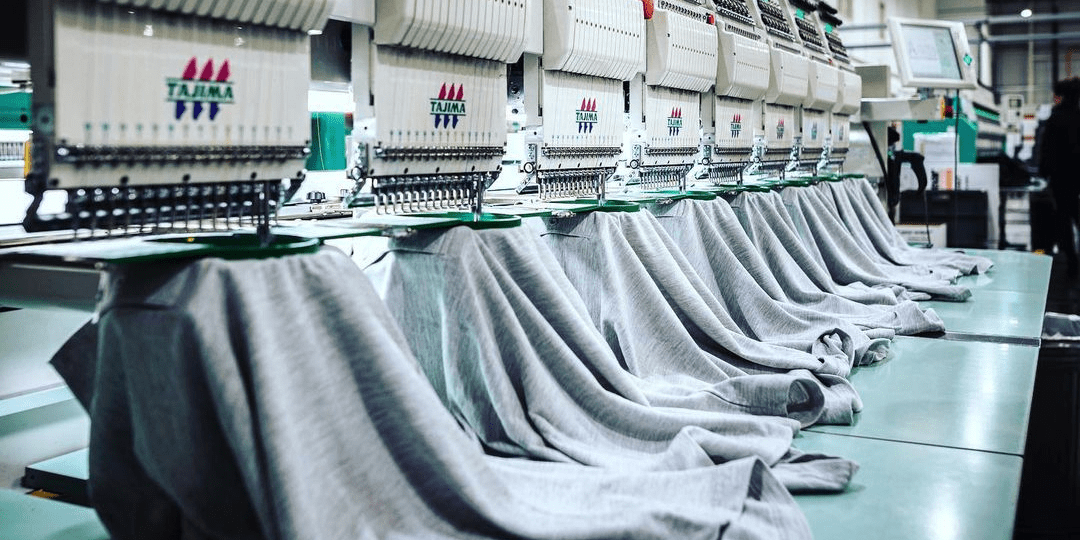 Newasia Garment production line manufacturing industrial workwear with advanced equipment and OEM expertise