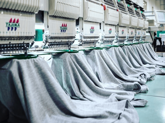 Newasia Garment production line manufacturing industrial workwear with advanced equipment and OEM expertise