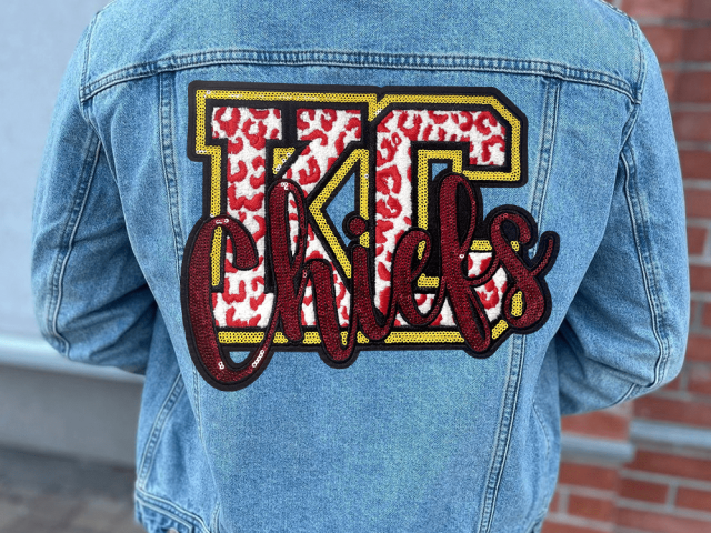 Sustainable laser distressing technology creating precise denim patterns and surface effects