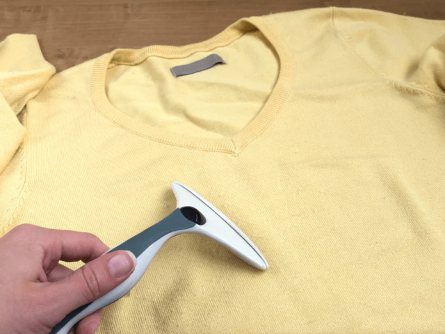 Dense cotton knit structure engineered to reduce fiber fuzz and fabric pilling