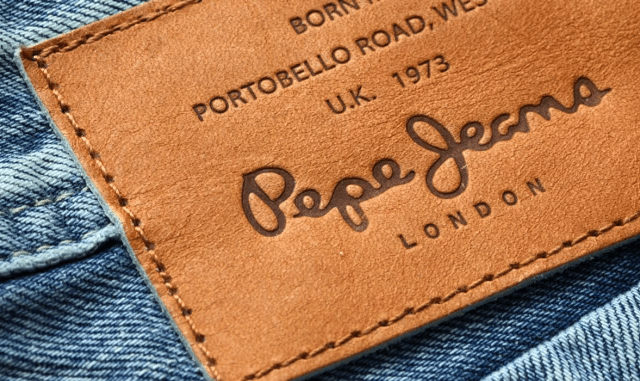 metal zipper and rivet hardware detail on jeans OEM manufacturing standard