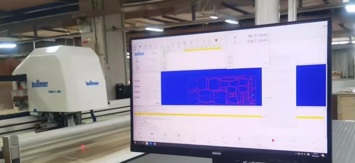 Automated denim fabric cutting process for precise garment pattern shaping
