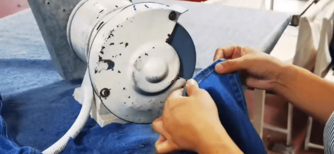 Denim finishing process improving garment appearance and comfort