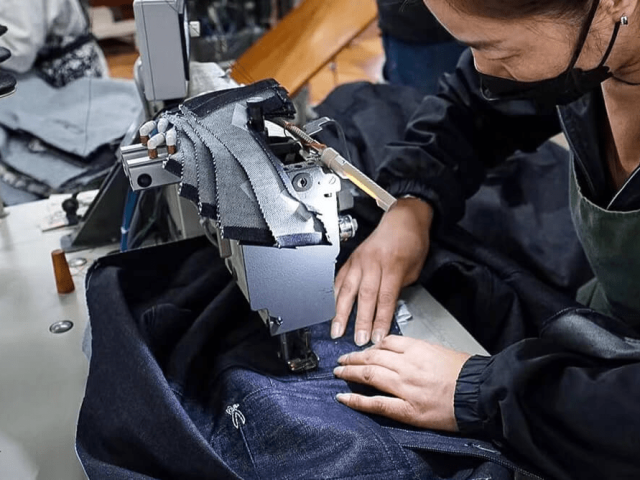 Precision double-needle stitching for durable custom trucker jackets