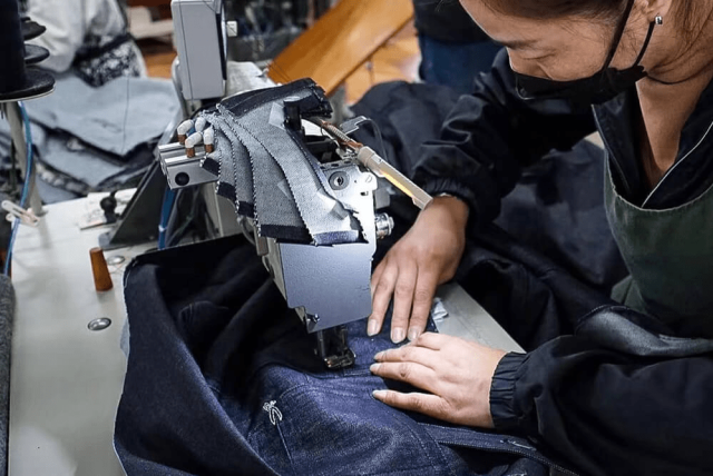 Precision double-needle stitching for durable custom trucker jackets