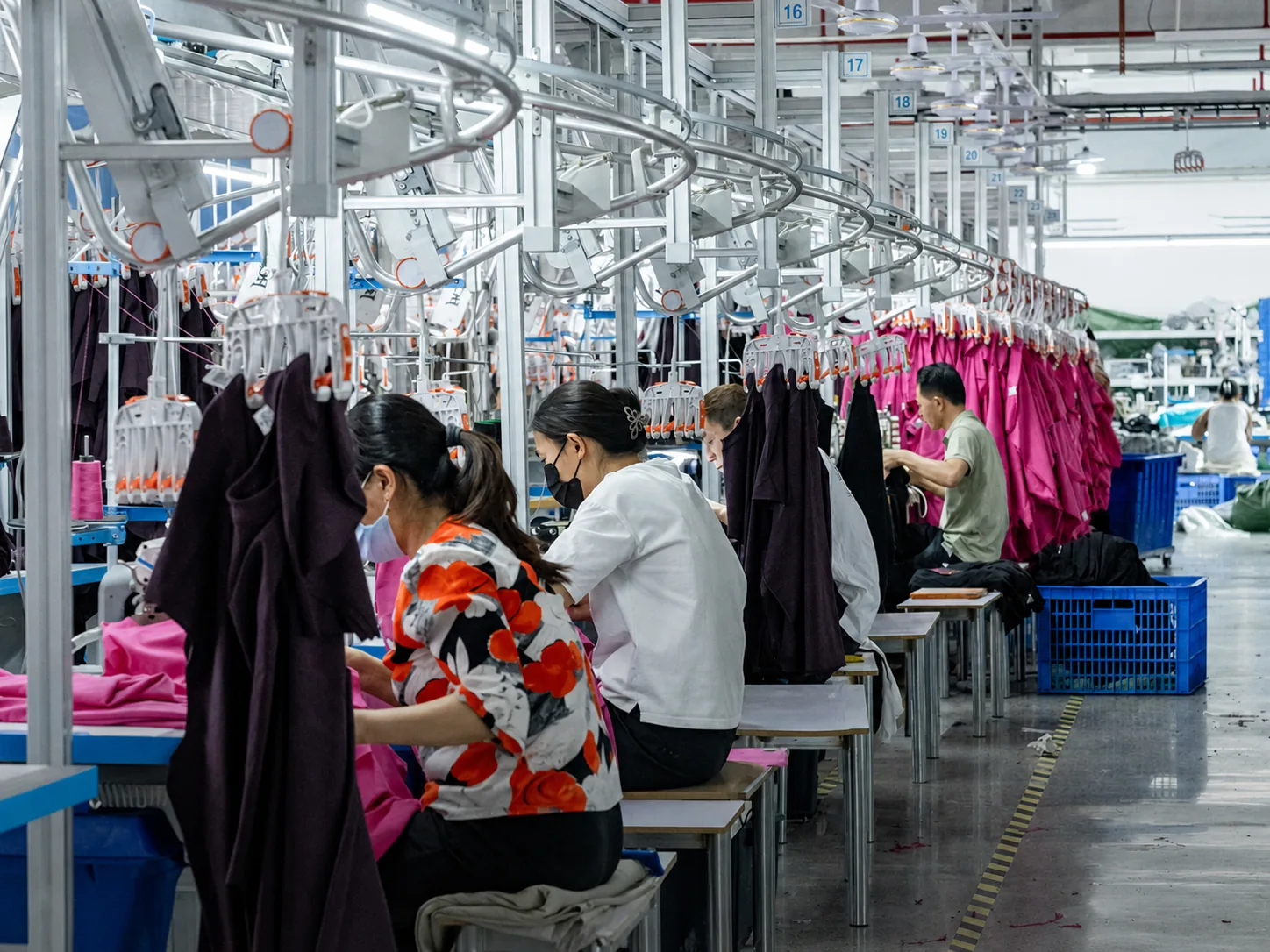 Garment production line with operators at New Asia Garment