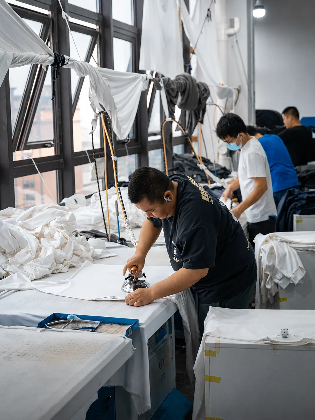 Garment pressing and finishing for private label apparel at New Asia Garment