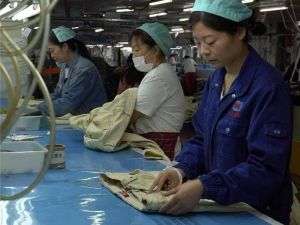 Finished-garment measurement inspection at New Asia Garment