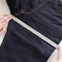 Denim hip and thigh measurement points illustrating fit-critical garment dimensions and tolerance ranges