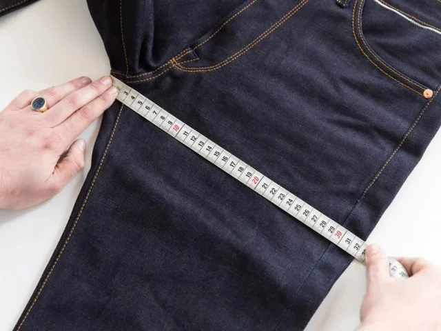 Denim hip and thigh measurement points illustrating fit-critical garment dimensions and tolerance ranges